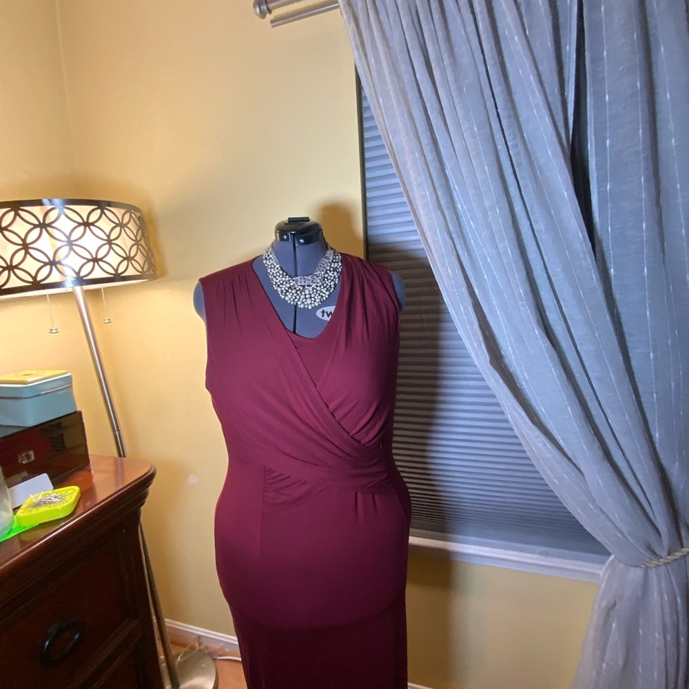 Sleeveless, faux wrap and stunning!